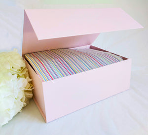 Pink Magnetic Gift Box open with stripy tissue paper