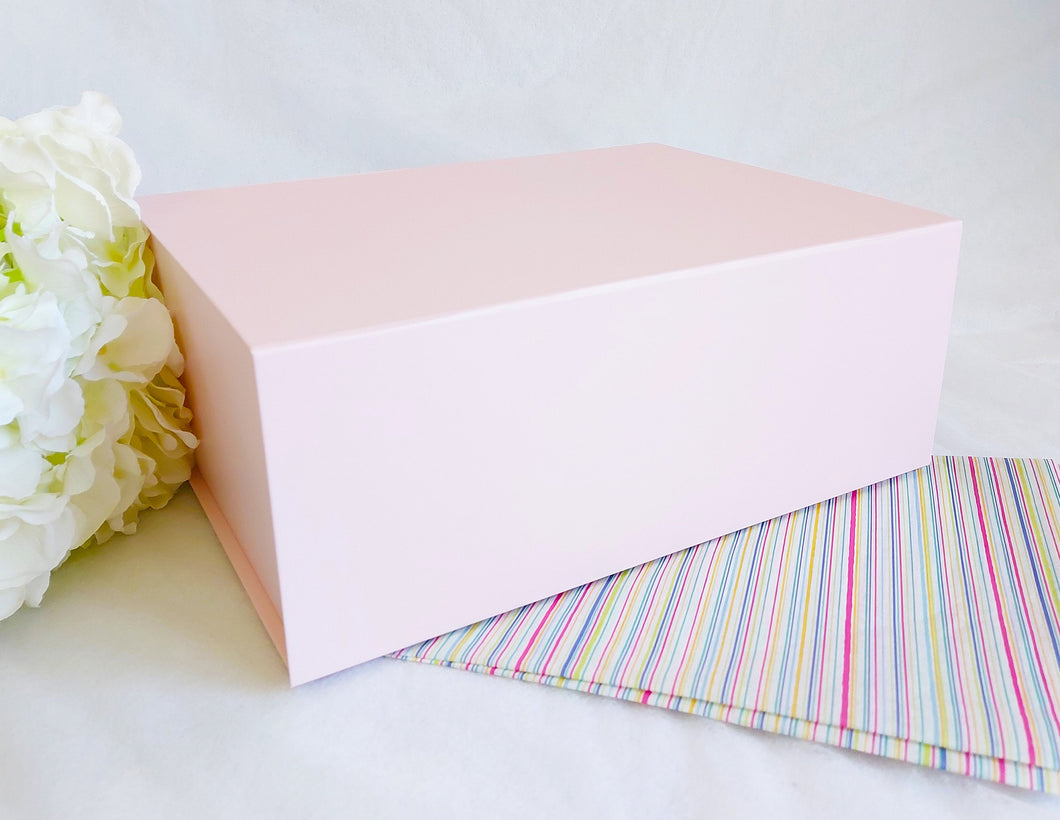 Pink Magnetic Gift Box front with stripy tissue paper