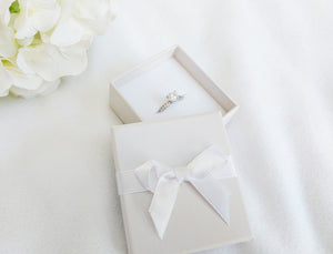Ivory Card Ring Box with attached Satin Ribbon Bow and Foam Insert open